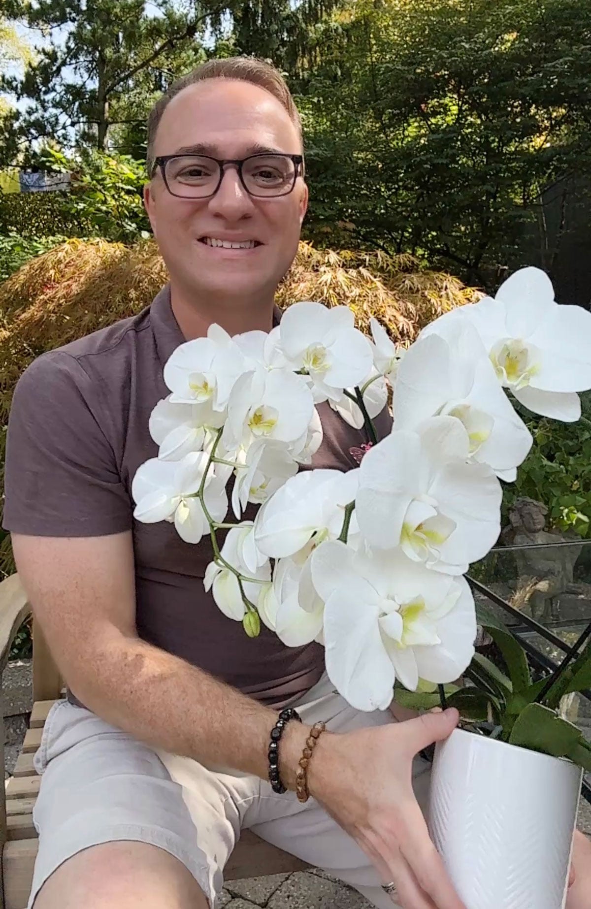 me and a Phalaenopsis orchid outdoors